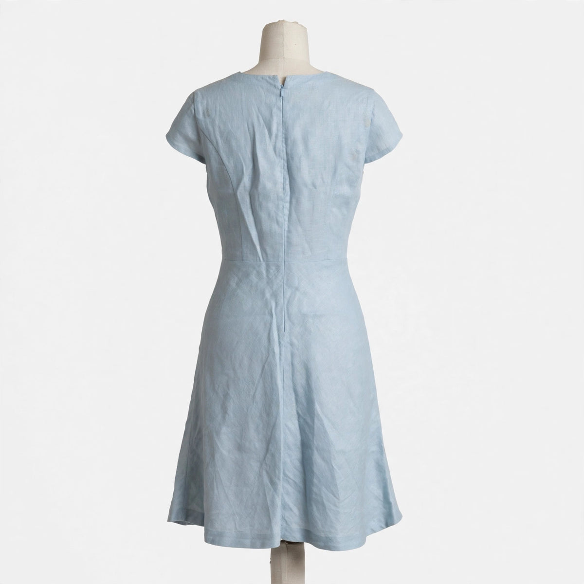 On a dress form