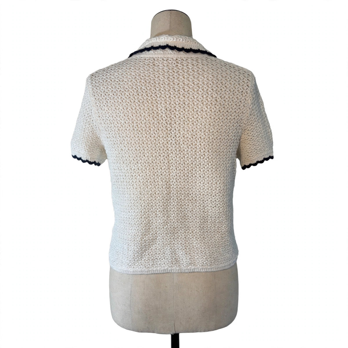 On a dress form