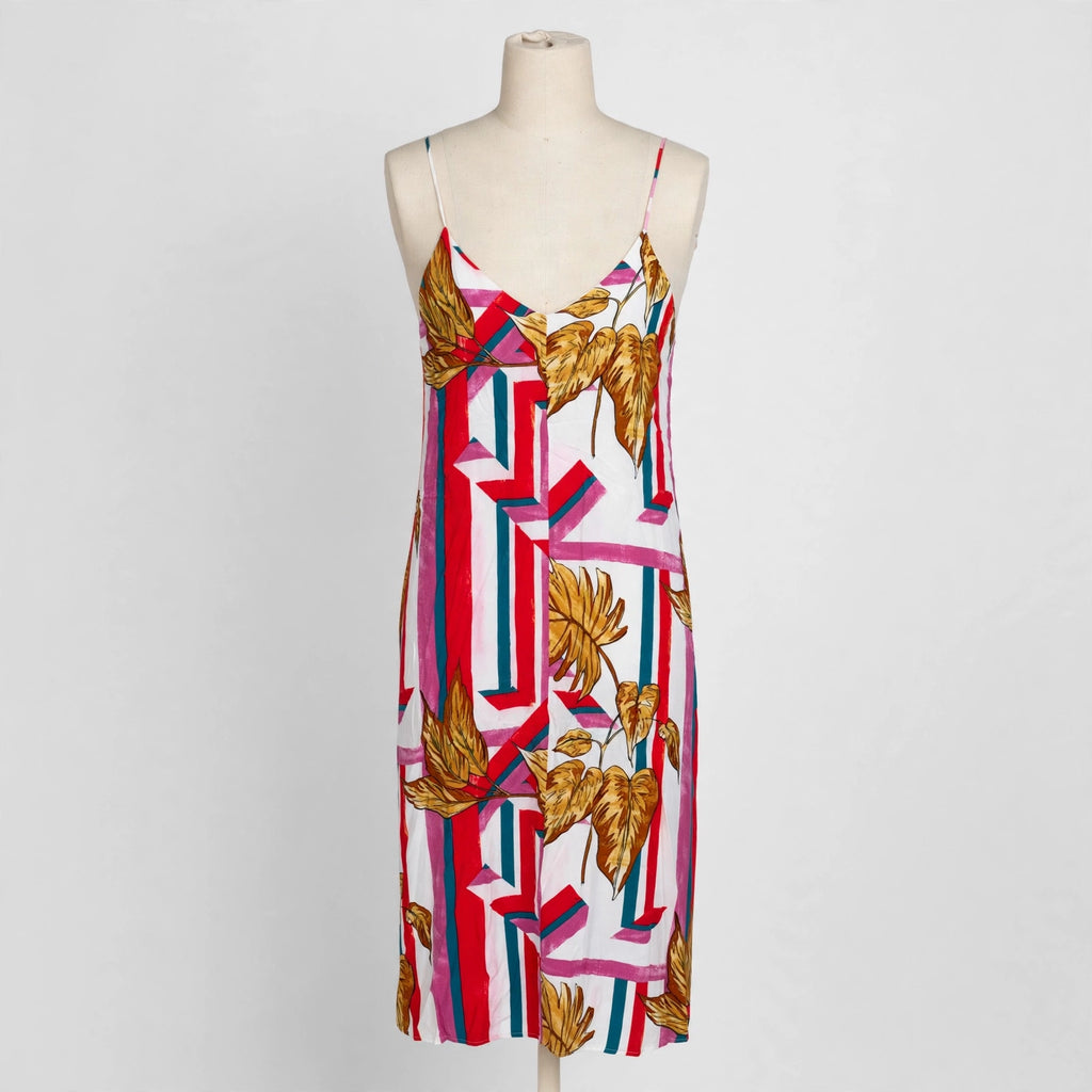 Lush striped leaf print slip dress on a dress form