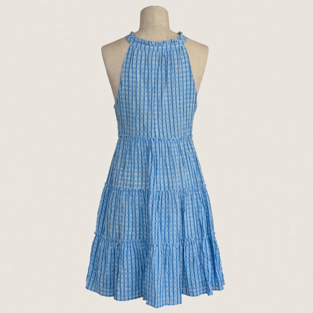 On a dress form