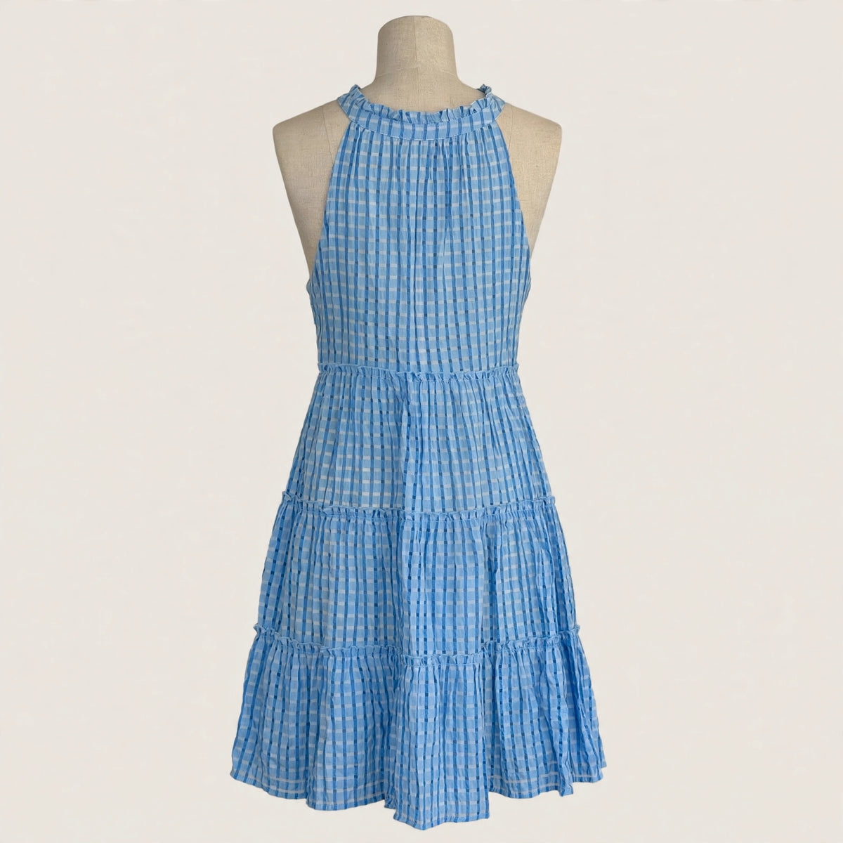 On a dress form